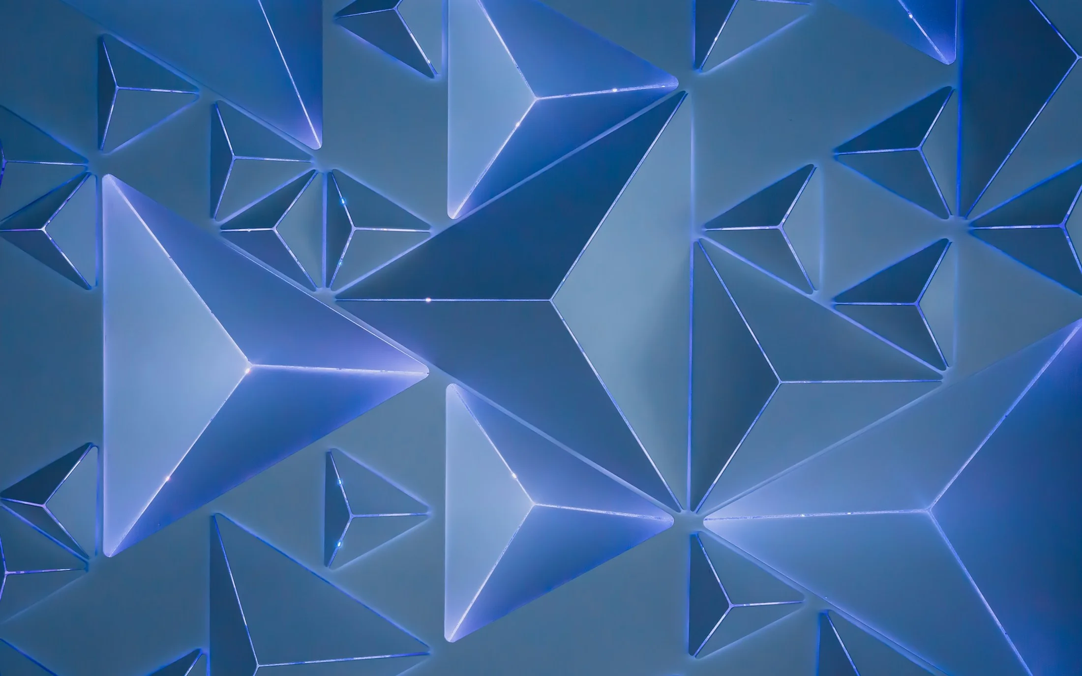 Abstract blue geometric facets forming a structured analysis field