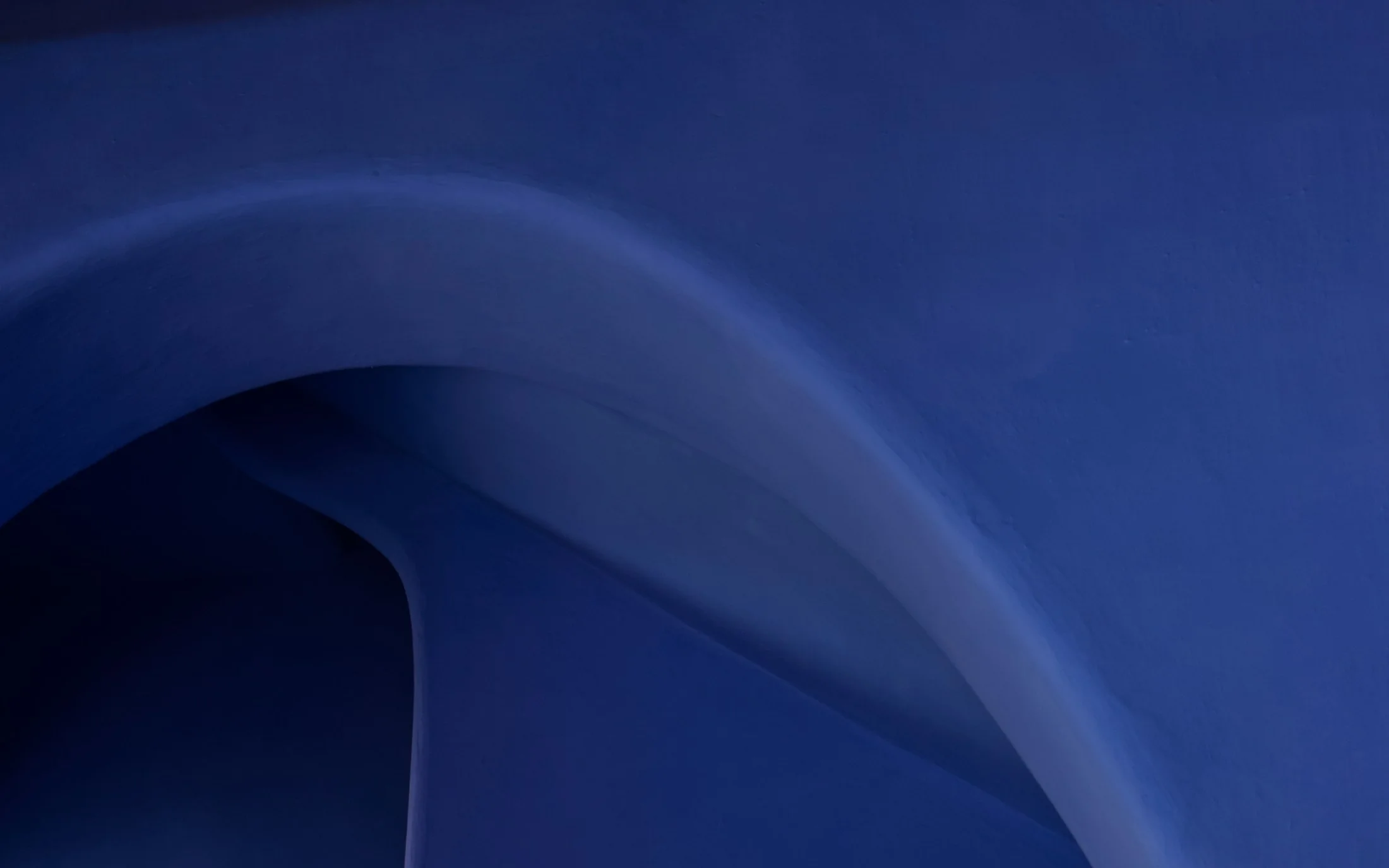 Layered blue architectural curves suggesting a modeled risk surface